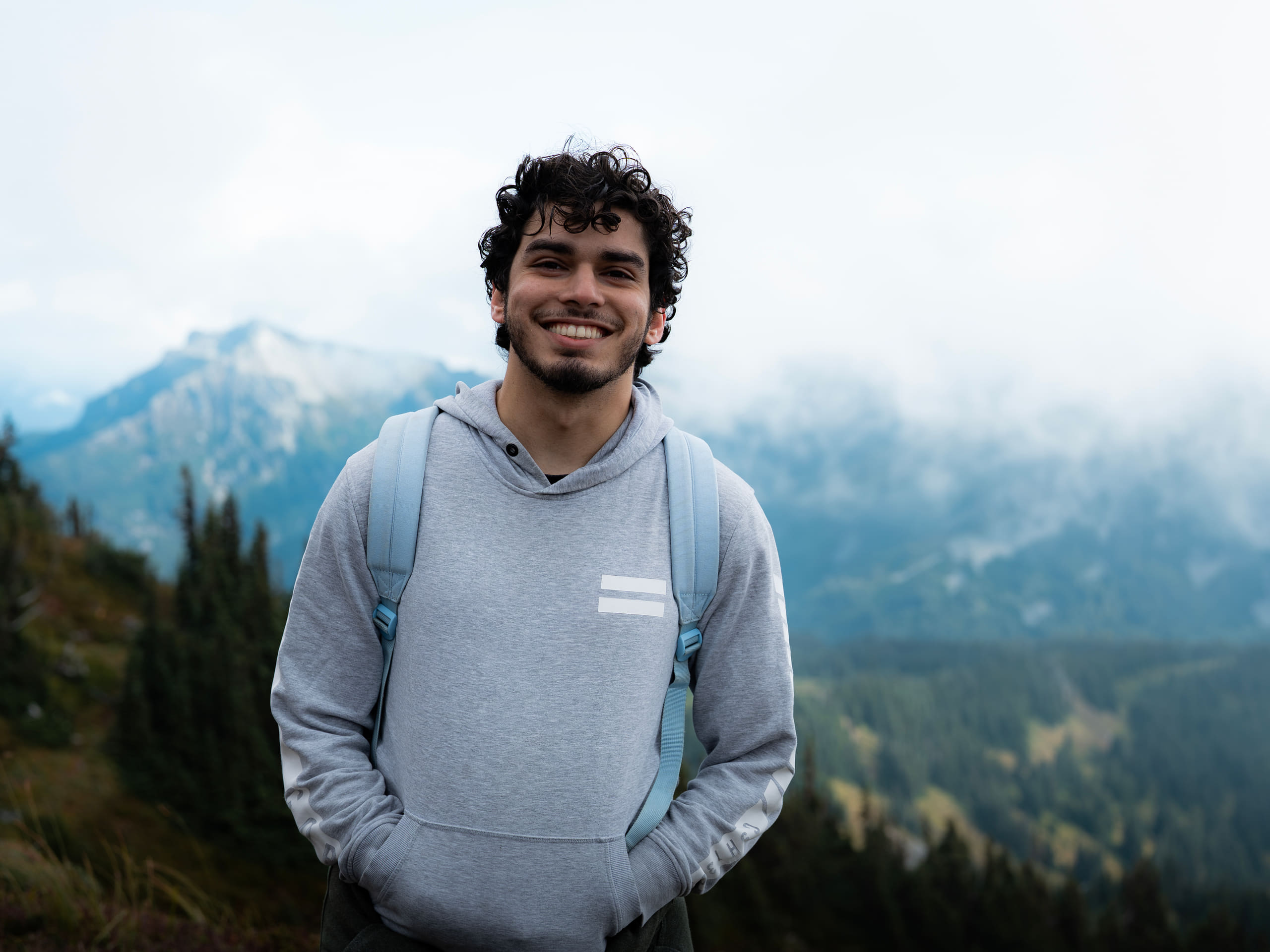 Mohammad Labadi on a mountain ridge above a misty valley, 2026